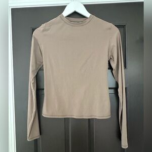 SKIMS Fitted Long Sleeve Tee in Brown and Tan